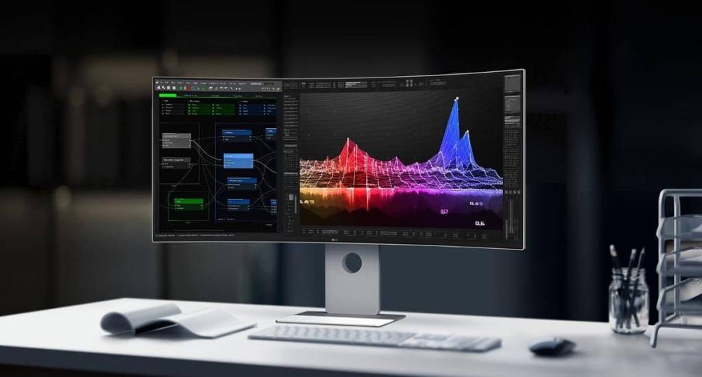 Monitor LG UltraFine 40WT95UF de 40 pulgadas con gráficos multicolores en pantalla, ideal para multitarea y análisis de datos.