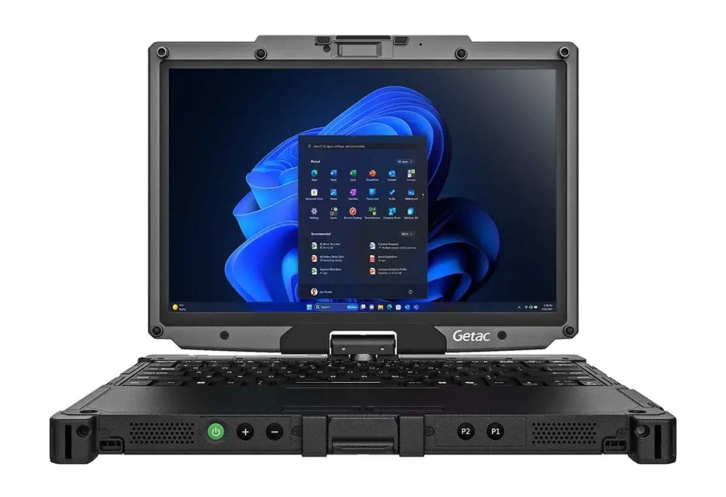 Computadora portátil robusta Getac V120 con pantalla encendida mostrando el sistema operativo Windows, diseñada para entornos extremos.